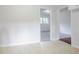 Bright view of the kitchen through the doorway from another room at 2110 Redbud Sw Ct, Marietta, GA 30008