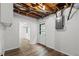 Unfinished basement area showcasing wood floors and exposed utilities at 2340 Castleridge Ct, Tucker, GA 30084