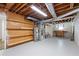 Unfinished basement with water heater, shelves, and exposed ceiling at 2340 Castleridge Ct, Tucker, GA 30084