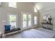 Entryway featuring a bench, console table, and French doors leading to the porch at 243 Hickory Way, Canton, GA 30115