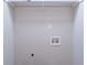 Unfinished laundry room with washer and dryer hookups, perfect for customization at 243 Hickory Way, Canton, GA 30115