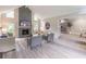 Bright living room features a stone fireplace and modern decor at 243 Hickory Way, Canton, GA 30115