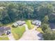 Aerial view showing homes nestled among mature trees and landscaping in a residential area at 3109 Albatross Ln, Decatur, GA 30034