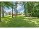 Expansive backyard with mature trees offers privacy and shade at 3109 Albatross Ln, Decatur, GA 30034