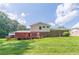Enjoy outdoor living with a spacious backyard and wooden deck at 3109 Albatross Ln, Decatur, GA 30034