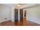 Bedroom featuring hardwood floors and a bathroom access at 3109 Albatross Ln, Decatur, GA 30034