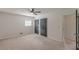 Spacious bedroom with ceiling fan and large closet for ample storage at 3109 Albatross Ln, Decatur, GA 30034