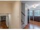 Inviting entryway features hardwood floors, double doors, and access to the living room with a fireplace at 3109 Albatross Ln, Decatur, GA 30034