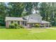 Charming home featuring a well-manicured lawn and a two-car garage at 3109 Albatross Ln, Decatur, GA 30034