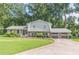 Charming home featuring a well-manicured lawn and a two-car garage at 3109 Albatross Ln, Decatur, GA 30034