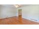 Bright living room with hardwood floors, ceiling fan, and a view into other rooms at 3109 Albatross Ln, Decatur, GA 30034