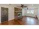 Spacious living room featuring a brick fireplace and hardwood floors at 3109 Albatross Ln, Decatur, GA 30034