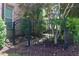 Iron fence gate to the backyard at 7825 Crownpoint Dr, Alpharetta, GA 30005