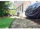 Backyard outdoor seating area on stone path at 7825 Crownpoint Dr, Alpharetta, GA 30005