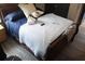 Cozy bedroom featuring a comfortable bed with soft bedding and neutral colors at 7825 Crownpoint Dr, Alpharetta, GA 30005