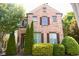 Beautiful two-story brick home with well-manicured landscaping and charming curb appeal at 7825 Crownpoint Dr, Alpharetta, GA 30005