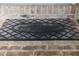 Welcome mat at the front entrance of the home at 7825 Crownpoint Dr, Alpharetta, GA 30005