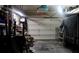 Organized garage space with tools, storage shelves, and ample room for vehicles and projects at 7825 Crownpoint Dr, Alpharetta, GA 30005