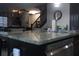 Modern kitchen with granite countertops, stainless steel appliances, and open layout at 7825 Crownpoint Dr, Alpharetta, GA 30005