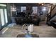 Open floor plan with kitchen island, dining area, living room and view of staircase at 7825 Crownpoint Dr, Alpharetta, GA 30005