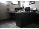 Well-lit office area featuring two large computer monitors and neutral wall paint at 7825 Crownpoint Dr, Alpharetta, GA 30005