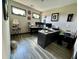Well-lit home office with large desk and modern decor at 7825 Crownpoint Dr, Alpharetta, GA 30005