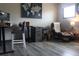 Bright office with ergonomic chair, a world map, and desk with wood storage at 7825 Crownpoint Dr, Alpharetta, GA 30005