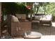 Inviting patio with comfortable wicker furniture, perfect for outdoor relaxation and entertainment at 7825 Crownpoint Dr, Alpharetta, GA 30005