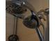 Close-up of a dual shower head with adjustable settings and sleek design at 7825 Crownpoint Dr, Alpharetta, GA 30005