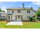 Backyard features a concrete patio and a green lawn at 1999 Barrett Knoll Nw Cir, Kennesaw, GA 30152