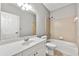 Bright bathroom featuring a bathtub and shower combo and a white vanity at 1999 Barrett Knoll Nw Cir, Kennesaw, GA 30152