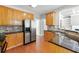 Well-equipped kitchen with granite counters, stainless appliances, and ample cabinets at 1999 Barrett Knoll Nw Cir, Kennesaw, GA 30152