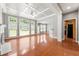 Spacious living room with hardwood floors, coffered ceiling, and fireplace at 1999 Barrett Knoll Nw Cir, Kennesaw, GA 30152