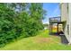 Backyard featuring a wooden deck and mature trees at 3865 Rifflepool Ct, Douglasville, GA 30135
