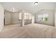 Spacious loft area with carpet and views of backyard through large windows at 3865 Rifflepool Ct, Douglasville, GA 30135