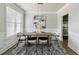 Dining room featuring decorative lighting and a modern rug at 4808 Albany Way, Atlanta, GA 30331