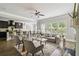 Open concept living area with lots of natural light and a view of the eat-in kitchen at 4808 Albany Way, Atlanta, GA 30331