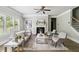 Cozy living room with a fireplace, white couches, and modern decor at 4808 Albany Way, Atlanta, GA 30331
