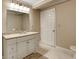 Updated bathroom featuring an updated vanity with a granite countertop at 537 Raven Springs Trl, Stone Mountain, GA 30087