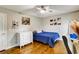 Comfortable bedroom offers hardwood floors, natural light, and closet space, providing a cozy personal space at 537 Raven Springs Trl, Stone Mountain, GA 30087
