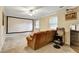 Recreation room featuring projector screen, vintage video game, and neutral walls at 537 Raven Springs Trl, Stone Mountain, GA 30087