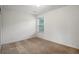 Bedroom with neutral walls and carpet at 926 Hawthorn Ln, Grayson, GA 30017