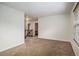 Spacious room with neutral carpet, natural light, and neutral paint at 926 Hawthorn Ln, Grayson, GA 30017