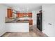 Well-equipped kitchen boasts granite countertops, stainless appliances, and ample cabinet space at 926 Hawthorn Ln, Grayson, GA 30017