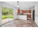 Open kitchen and dining space with stainless steel appliances and a view of the backyard at 926 Hawthorn Ln, Grayson, GA 30017