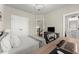 Bedroom featuring ensuite bathroom, closet, and chandelier lighting at 226 Chastain Preserve Ne Ln, Atlanta, GA 30342