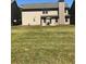 Expansive backyard with a well-maintained lawn, offering ample space for outdoor activities and recreation at 3299 Arbor Oaks Dr, Snellville, GA 30039