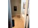 Well-lit bathroom featuring tiled floors, a soaking tub and a glass shower door at 3299 Arbor Oaks Dr, Snellville, GA 30039