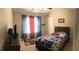 Charming bedroom with sports themed decor, ample natural light and closet at 3299 Arbor Oaks Dr, Snellville, GA 30039