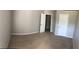 Spacious, carpeted bedroom with neutral paint and a double-door closet at 3299 Arbor Oaks Dr, Snellville, GA 30039
